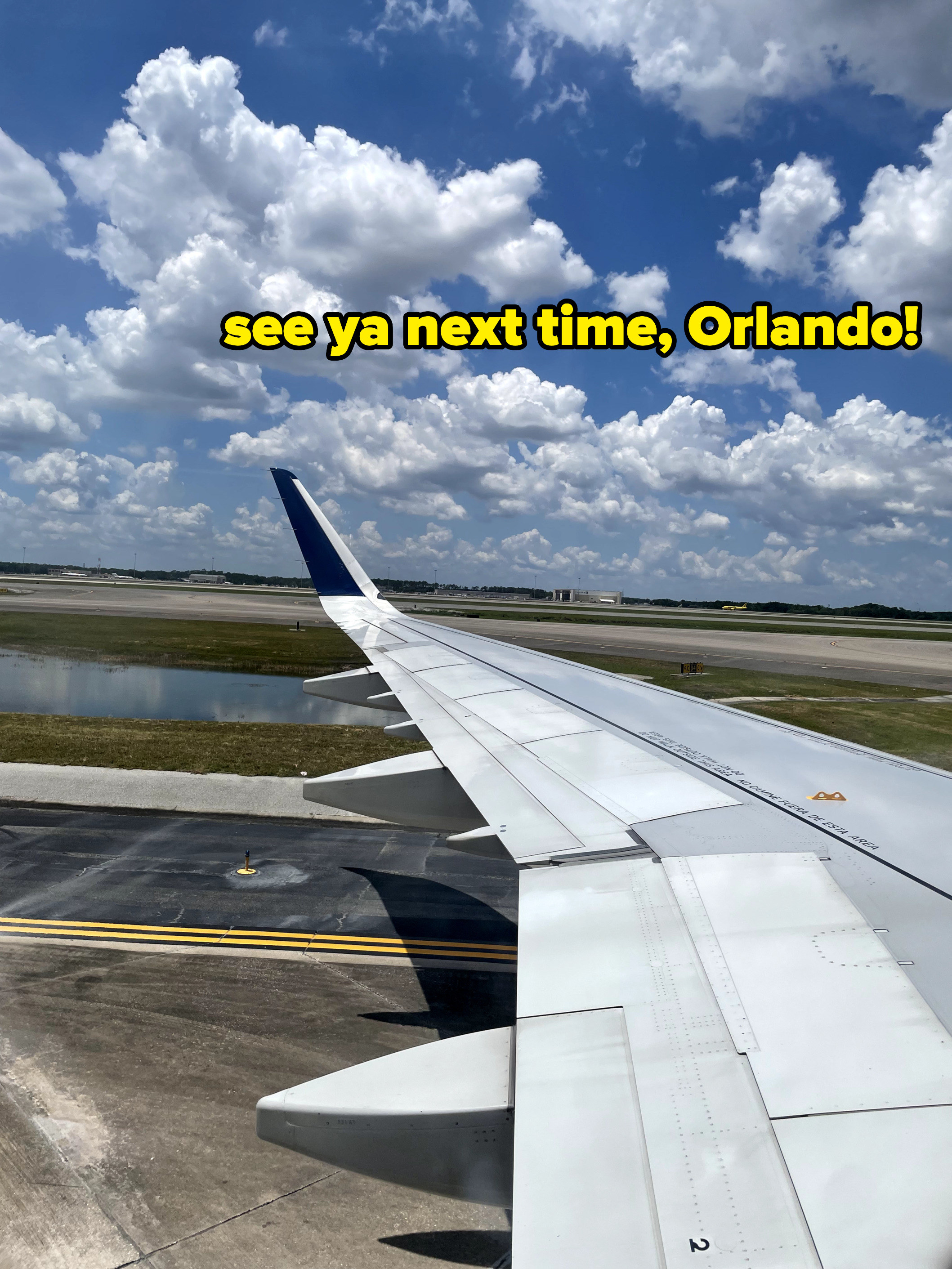 plane wing with the words &quot;See you next time, Orlando&quot;