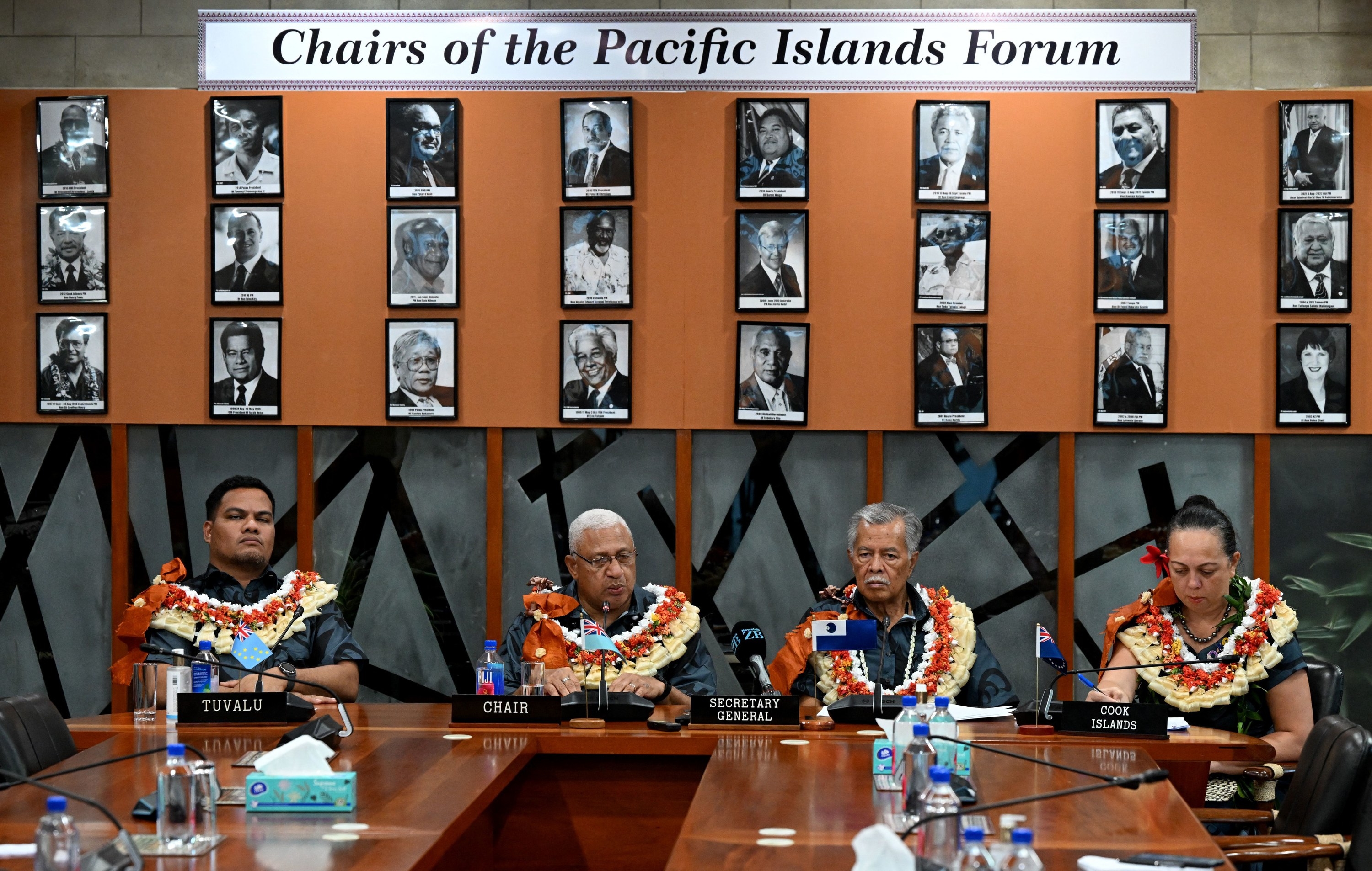 Simon Kofe sits with other chairs of the Pacific Islands Forum
