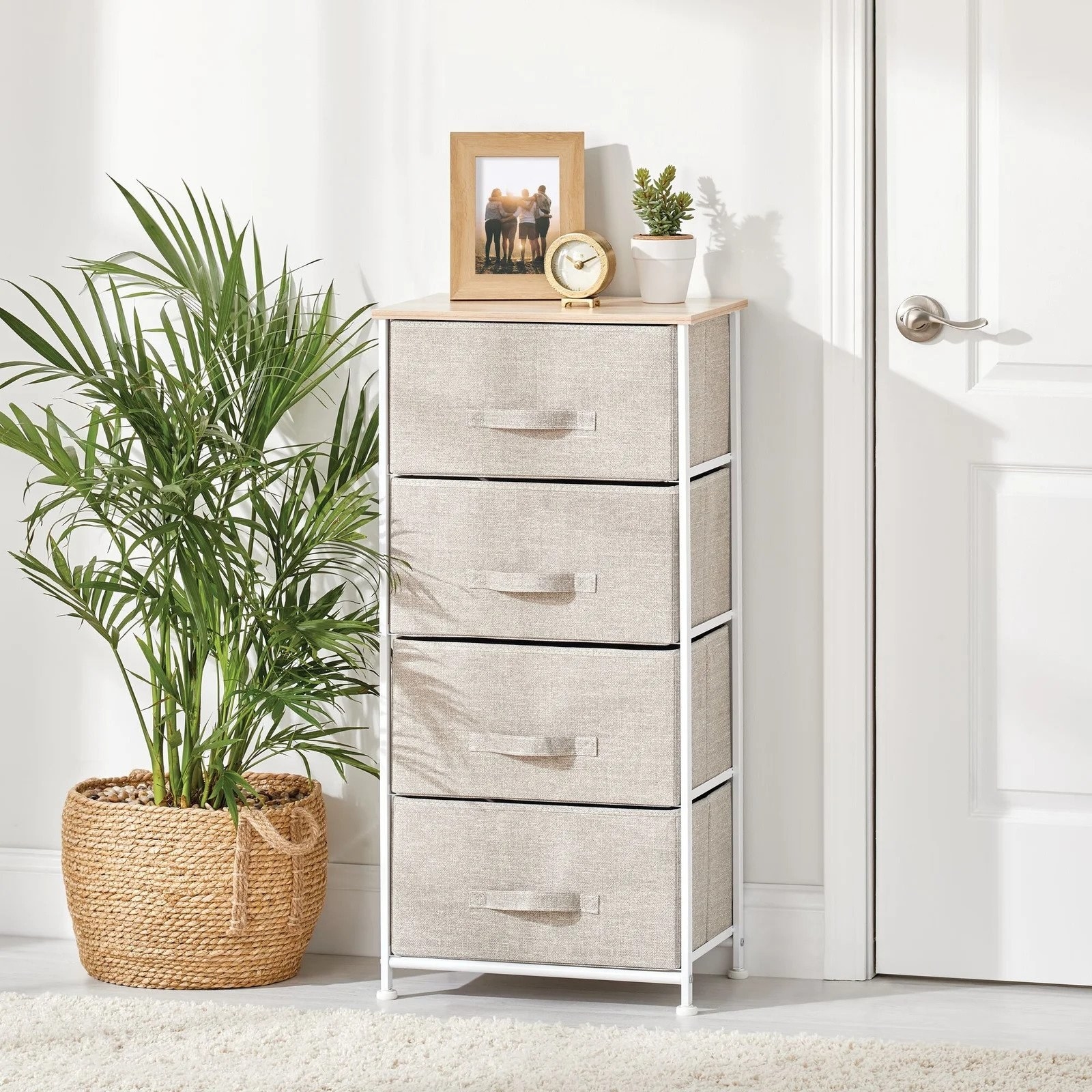 Long 4 drawer dresser with beige canvas drawers and white metal hardware