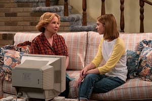Leia Forman sits on the couch with her grandmother Kitty Forman