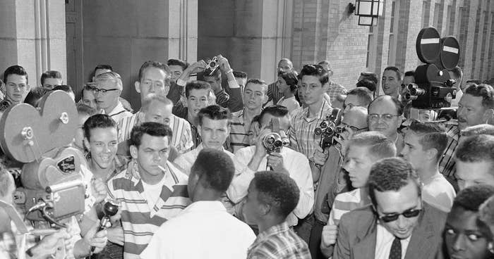 Jerry Jones in at North Little Rock High School in1957, blocking Black students from entering.