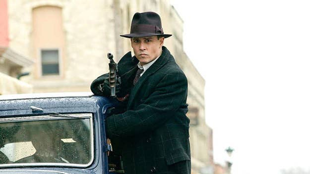 Does Johnny Depp's new flick about 1930s bank robbers deliver or make off with your money? Read our critic's thoughts.