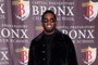 Sean “Diddy” Combs poses for a photo at his Capital Preparatory School