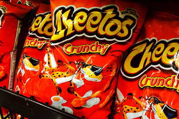 Bags of Cheetos snack chips are pictured