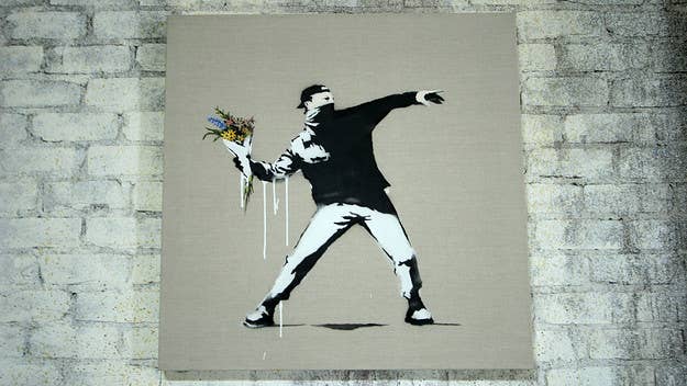 Banksy told his followers to shoplift from the Regent Street Guess store in London after it displayed a collection that used his artwork without permission.