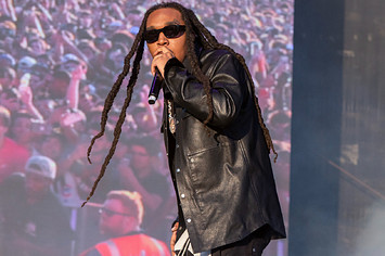 Takeoff is seen performing live at a festival