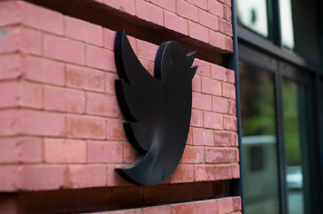 Twitter bird logo is pictured on office