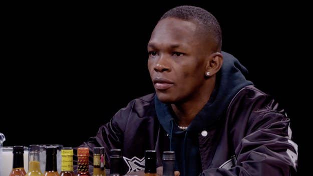 On 'Hot Ones,' MMA fighter Israel Adesanya broke down how anime has inspired him and what movie best showcases what it means to be a fighter.