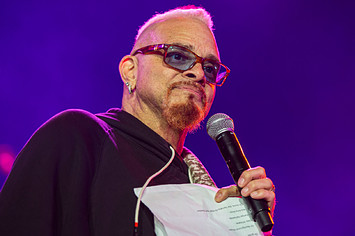 Sinbad is seen speaking to the crowd at a public event