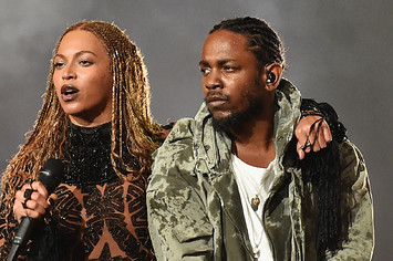 Singer Beyonce (L) and rapper Kendrick Lamar perform