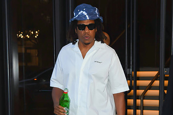 Jay Z is pictured holding a water bottle