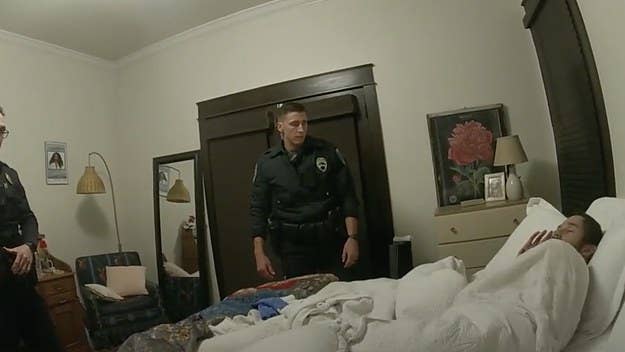 Newly released bodycam footage shows police arresting the chief financial officer for Tyson Foods after he was found sleeping in a stranger's bed.