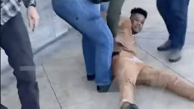 Footage of the Las Vegas arrest sees a bystander narrating, “The undercover cops just pulled up on him. … They just got his ass and threw him down."