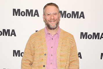 Seth Rogen smiling on a red carpet at MoMA
