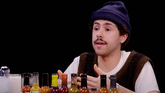 On the latest 'Hot Ones,' Golden Globe winner Ramy Youssef opens up about everything from the continued influence of Larry David to dealing with hecklers.