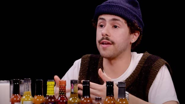 On the latest 'Hot Ones,' Golden Globe winner Ramy Youssef opens up about everything from the continued influence of Larry David to dealing with hecklers.
