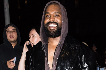 Ye is pictured wearing a hoodie under a jacket