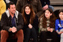 Adam Sandler, his wife, and two daughters at New York Knicks game