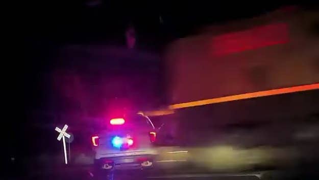 Colorado police released bodycam and dashboard footage showing a woman—who ultimately survived—handcuffed and left in a patrol car before it was hit by a train.