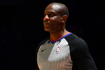 NBA Referee Tony Brown looks on during a game.