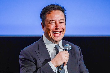 Tesla CEO Elon Musk smiles as he addresses guests at the Offshore Northern Seas 2022