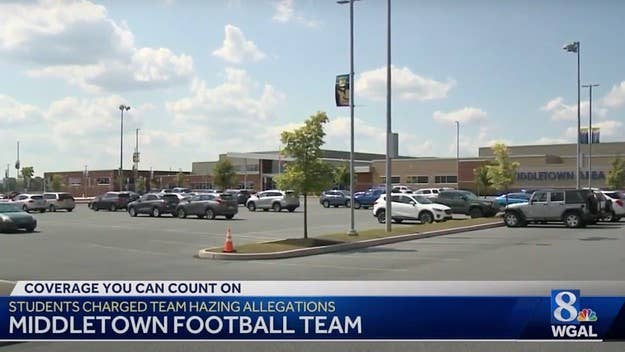 Authorities say some of the incidents occurred on campus and were captured on video. The team's head coach resigned shortly after the footage surfaced.