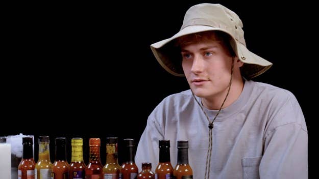 Prolific video director and Lyrical Lemonade founder Cole Bennett is the latest to step onto the 'Hot Ones' stage for the hottest of questions.