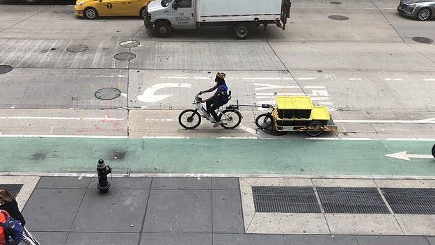 New York City council members are considering a new proposal that would pay civilians for reporting bike-lane violations to the Department of Transportation.