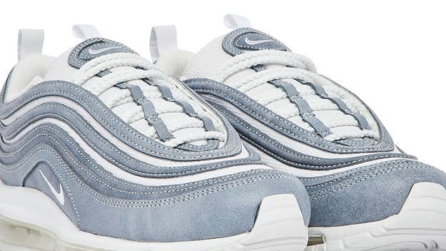 A pair of Comme des Garçons x Nike Air Max 97 collabs were spotted in the fashion label's Fall/Winter 2022-23 collection. Click here for the official details.
