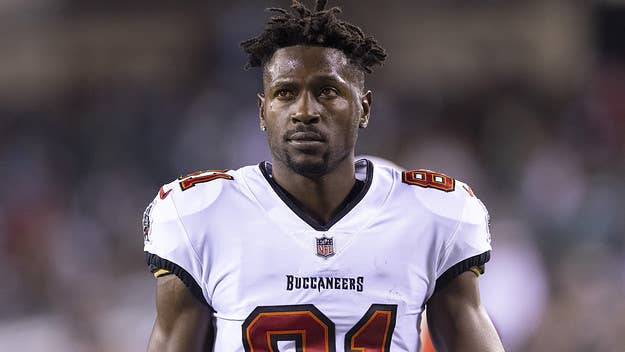 Football fans are scratching their heads after footage captured Antonio Brown exposing himself to guests while swimming in a pool at a posh Dubai hotel.