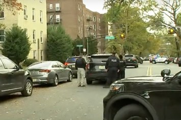 Two Newark police officers were shot while serving a warrant on Tuesday