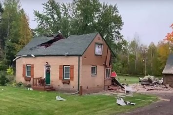 The damage from a small plane crash at a home in Minnesota is shown