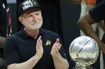 Robert Sarver is pictured clapping at an event