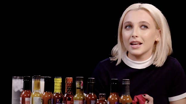 Emma Chamberlain talks Jack Harlow, the evolution of her editing style, the best types of peanut butter, and much more in the latest 'Hot Ones.'