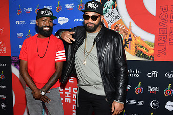 Desus and Mero are seen on a red carpet