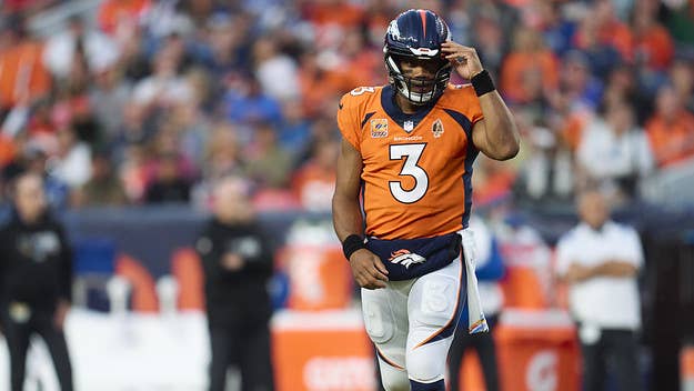 Denver Broncos quarterback Russell Wilson played the team's Thursday night game against the Colts with a partially torn lat, ESPN's Adam Schefter reports.