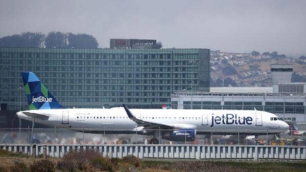 A man was banned from JetBlue after he was caught on video spewing racial slurs to a woman on a flight from Jamaica to New York City.