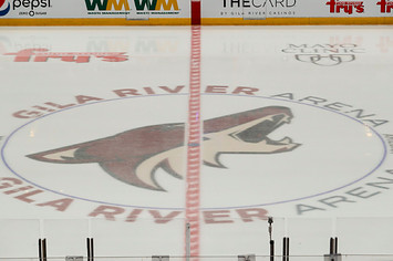 The Coyotes logo on the ice during the NHL hockey game against the Chicago Blackhawks.