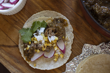 Tacos made with chile verde braised pork