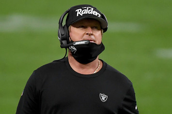 Jon Gruden wears a protective face mask incorrectly on the sideline against the Bills.