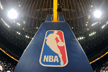 A shot of nba logo on the basket during the game between the Clippers and Warriors.