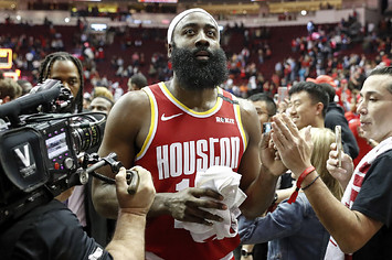 James Harden #13 of the Houston Rockets greets fans on the way to the locker room