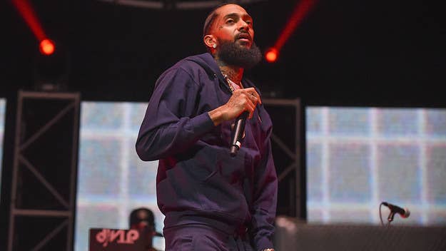 The late rapper's brother Samiel Asghedom is suing the gang for allegedly filing multiple trademarks for the phrase in 2019, shortly after Nipsey's death.