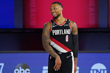 Damian Lillard smiles and celebrates after the Western Conference Play in Game.