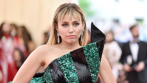 Miley Cyrus dismisses Fourth of July celebrations and her anthemic song "Party in the U.S.A.," saying there isn't anything to honor until everyone has freedom.