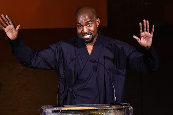 Kanye West presents the Fashion Icon Award to Pharrell Williams