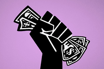 Black power fist holding money