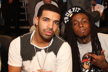 Lil Wayne and Drake pose for a photograph