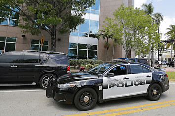 A Miami Beach police car sits outside the headquarters of CONCACAF