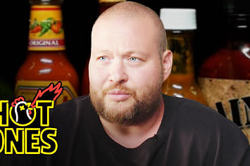 ACTION BRONSON SHAKES IT OUT WHILE EATING SPICY WINGS | HOT ONES